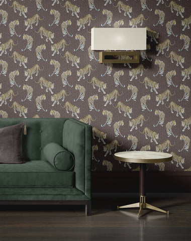 Brown leopard wallpaper used in a warm interior with natural wood, neutral textiles and classic animal print styling