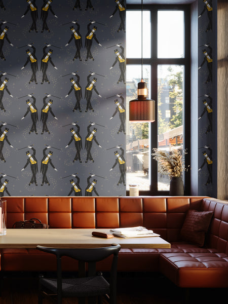 Black and mustard cabaret wallpaper styled in a restaurant dining area with tan leather seating