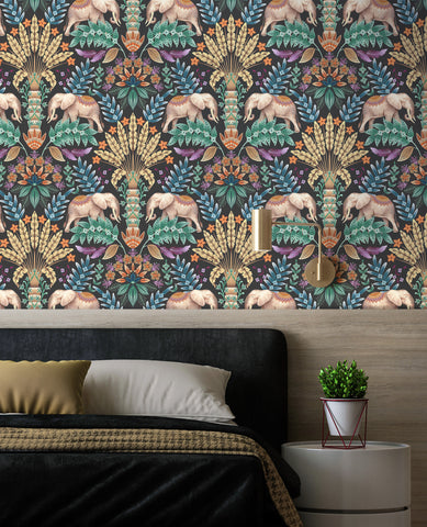 Charcoal elephant wallpaper used as a luxury feature wall with tropical animal design and dark modern interior styling