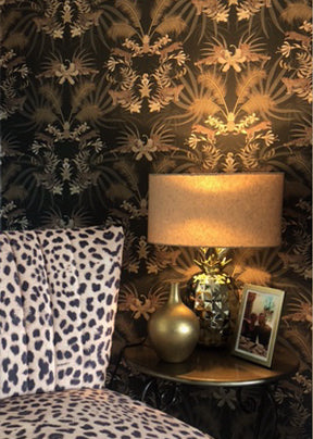 Charcoal Leopard Luxe wallpaper used as a dark luxury statement wall with golden palms and animal print design