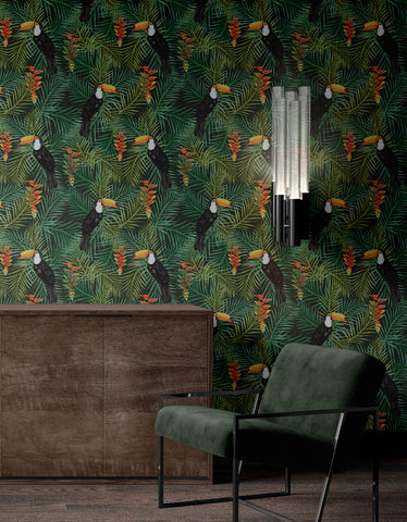 Green toucan wallpaper used in a living room with dark wood cabinet, green chair and tropical bird pattern