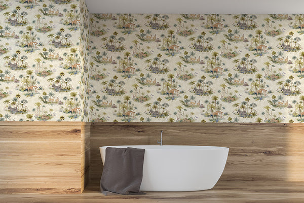 Cream safari animal wallpaper above wood panelling and freestanding bath in a neutral bathroom