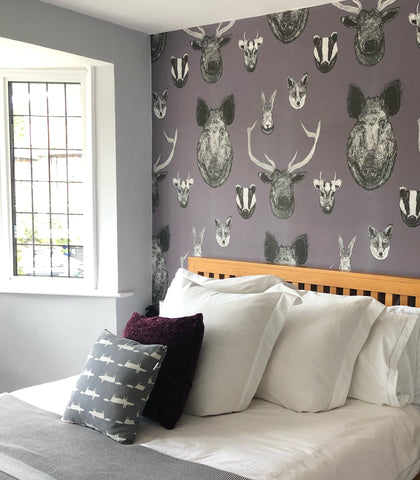 Grey animal wallpaper pattern with hand-drawn British wildlife, deer, wild boar and heritage decorative details