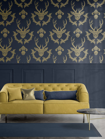 Blue and gold stag wallpaper with hand-drawn deer head, antlers and ornate filigree repeat